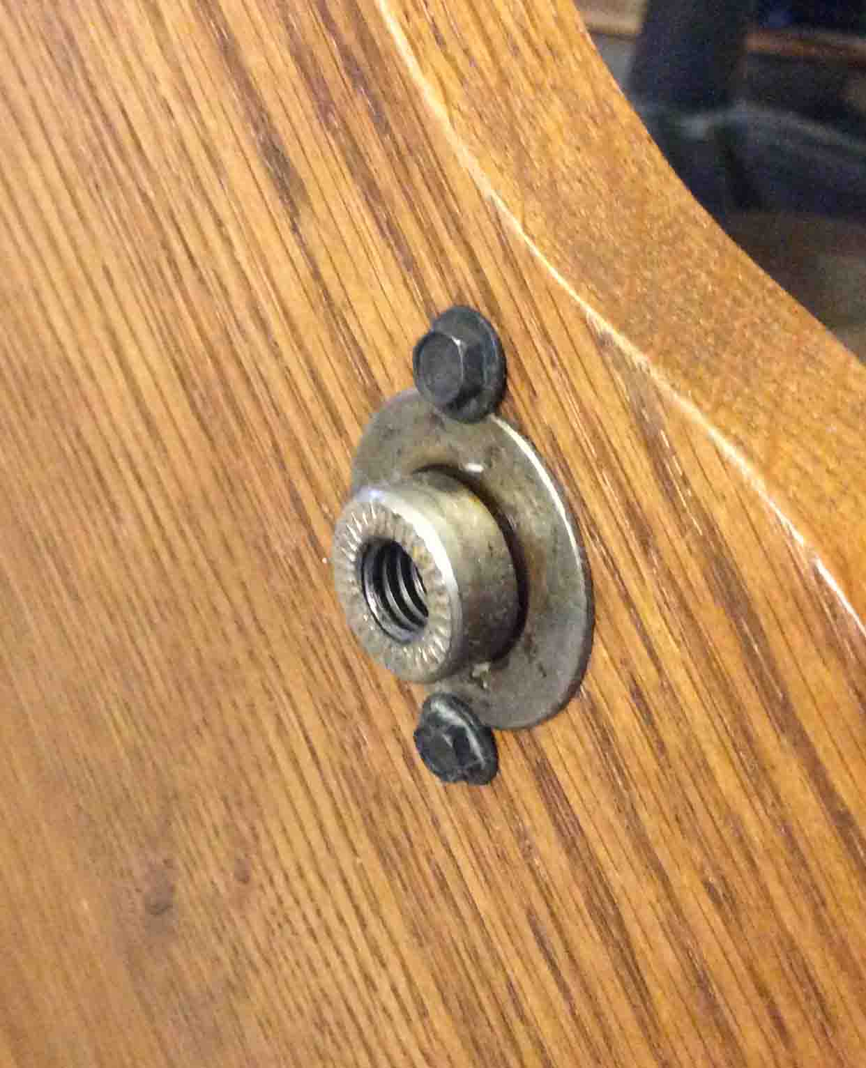 Picture of an exposed Bearing Shaft On Glider Rocker. with base