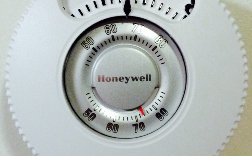 Picture of the installed Honeywell Large Dial Thermostat, T87N1026.