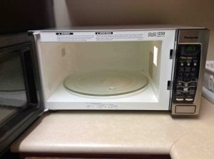 Picture of the Panasonic Inverter NN-SN778 Microwave Oven with its door open, showcasing its interior.