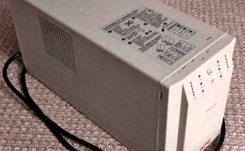 Picture of the APC Smart UPS SU1400NET Uninterruptible Power Supply, about to undergo repairs.