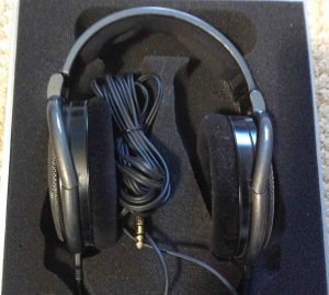 Picture of the Sennheiser HD650 Hi Fi Headphones, packed in included case.