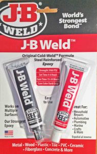 Picture of a card of J-B Weld Steel Reinforced Epoxy High Temperature Glue, Front View.
