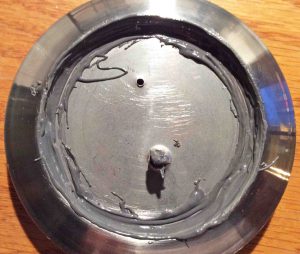 Picture showing the J-B Weld Steel Epoxy, Applied to Metal Lid Part
