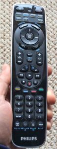 Picture of the Philips SRB5107 / 27 remote control, being held in the hand. 