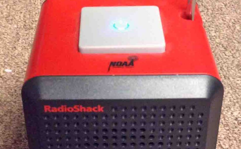 Picture of the Radio Shack 12500 NOAA Cube Weather Radio, Operating, Antenna Extended.