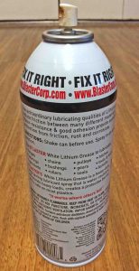 Picture of the rear view of a can of Blaster Spray White Lithium Grease, showing applications and instructions. 