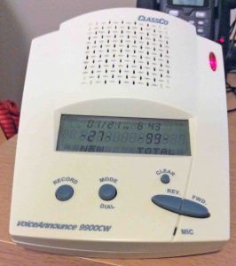 Picture of the talking caller Id box from ClassCo, showing the top view, including the controls, message waiting light, speaker, and visual display. 
