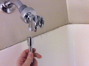 Picture of an installed holder for hand held shower sprayer.