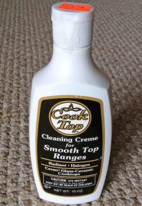 Picture of the front of a 10 ounce bottle of Cooktop Cleaning Cream for smooth top ranges. 
