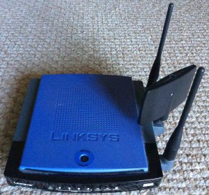Picture of the Linksys WRT300N V1 broadband wireless router, front view. 