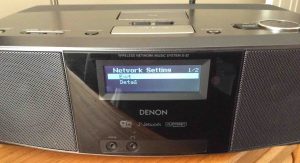Picture of the Denon S-32 Internet Radio, displaying the -Network Setting- screen after successful Wi-Fi connection established, with the -Exit- menu item selected.