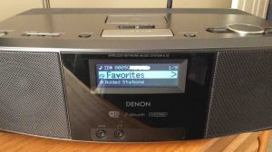 Picture of the Denon S-32 Network Music Player, displaying its Main Menu after successful Wi-Fi connection established. The reconnect WiFi process succeeded. 