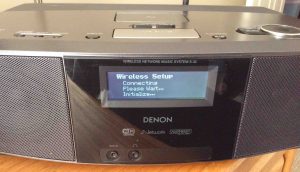 Picture of the Denon S-32 Network Radio Player, displaying the Wireless Setup-Connecting-Wait-Initialize screen.