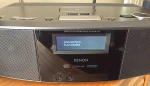 Picture of the Denon S-32 internet radio, displaying the -Connection Succeeded- screen after successful reconnect WiFi procedure. 