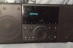 Picture of the Logitech SqueezeBox Boom, attempting to connect to Wi-Fi network.