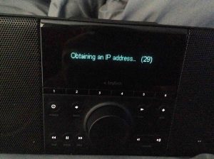 Picture of the Logitech Squeezebox Boom Radio, Obtaining IP Address screen.