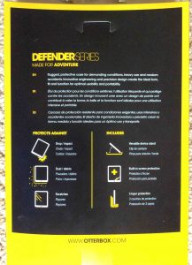 Picture of the original carton rear of the Defender. Showing a list of advantages.