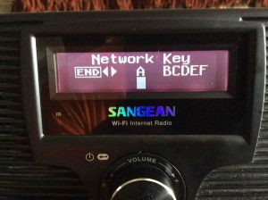 Picture of the Sangean WFR-20 radio, displaying the Network Key Entry screen.