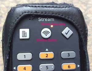 Picture of the Victor Reader Stream, New Generation, showing Wireless Button and Wireless Status Lamp, labeled in pink text.