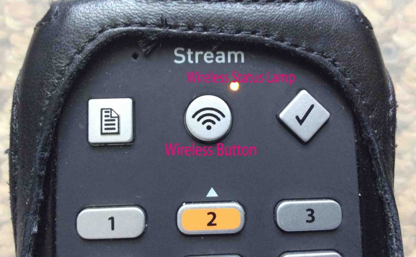 Picture of the Victor Reader Stream, New Generation, showing Wireless Button and Wireless Status Lamp, labeled in pink text.