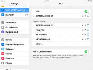Picture of the iOS WiFi Network Connections Screen, showing a list of available in-range, and connected WiFi networks. 