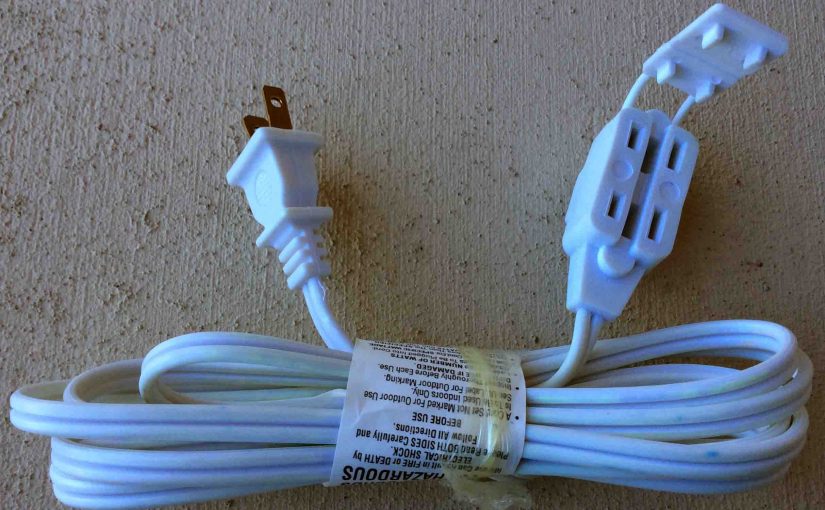 Picture of a Three outlet white extension cord, light duty indoor model.