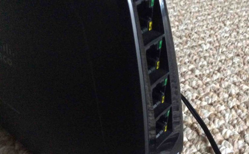 Picture of the slanted back panel Ethernet ports on the Cisco Linksys WES610N Wireless Network Bridge.
