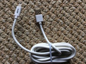 Picture of the DE 9 Ft. charging and sync lightning cable, unpacked.