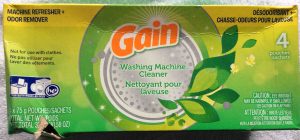 Picture of a 10.58 ounce box of Gain washing machine cleaner, four pouch, top view.