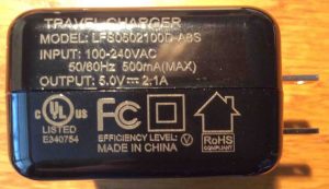 Picture of the Xtreme Dual Port USB Home Charger LFS0502100DA8S, specifications label edge view.