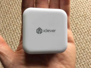 Picture of the iClever dual USB wall Charger IC-TC02 AC adapter, flat side view.
