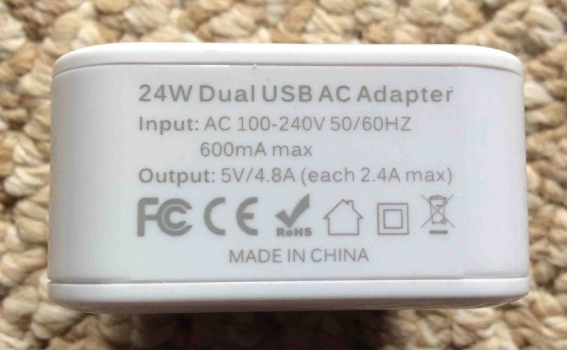 Picture of the iClever IC-TC02 Two Port USB Wall Charger, showing the label side view.