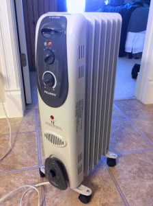 Picture of the Pelonis Electric Radiator Heater HO-0250H, front view.
