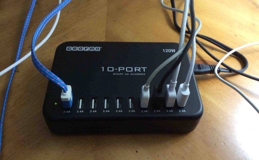 Picture of the Gearmo® 10-Port Smart USB Charger, ICS-10P-HO, operating, with some cords connected.
