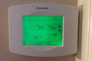 Picture of the Honeywell RTH8580WF Thermostat, displaying its Home screen.
