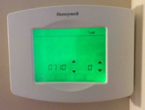 Picture of the thermostat, showing the -Restore Original Settings- option 0710.