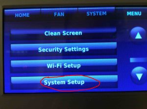 Picture of the Honeywell RTH9580WF Smart WiFi Thermostat, Menu, System Setup button highlighted.