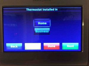 Picture of the Honeywell RTH9580WF smart WiFi thermostat, displaying the Thermostat Installed In screen. 