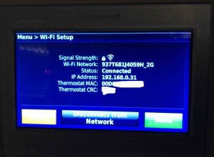 Picture of the thermostat displaying the -Wi-Fi Setup- screen, showing that the network connected successfully.