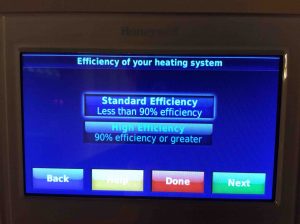 Picture of the Honeywell RTH9580WF WiFi Smart Thermostat, displaying the Efficiency Of Your Heating System screen.