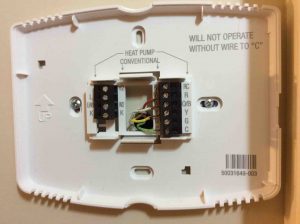 Picture of the wall plate for a 4 wire smart thermostat installation, using the green wire as the C wire instead of the G (fan) wire. 