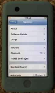 Picture of the Apple iPod Touch portable media player, displaying the General Settings screen.