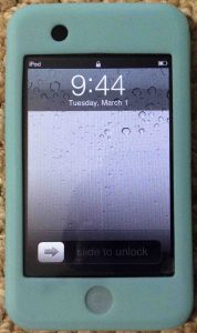 Picture of the iPod Touch portable player, displaying the Lock screen.