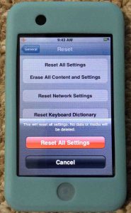 Picture of the Apple iPod Touch Player, displaying the Reset All Settings confirmation screen.