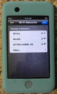 Picture of the Apple iPod Touch player, showing the WiFi Networks selection screen.
