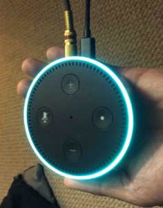 Picture of the Amazon Echo Dot 2nd generation smart speaker, top view. Restart Alexa Echo Dot.