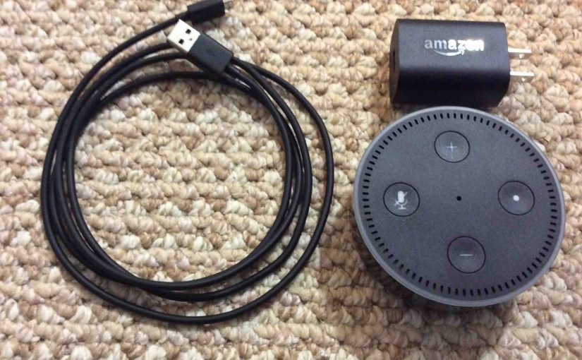 Picture of the Amazon Alexa Dot 2nd Gen with adapter and USB cable.