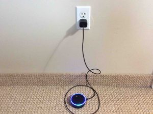 Picture of the unboxed Amazon Echo Dot 2nd Gen Speaker, plugged in and booting. Powering up. How to Connect Alexa to Another WiFi.