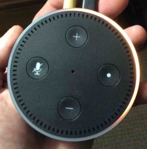 Picture of the Alexa Echo Dot Gen 2 in Setup Mode, after factory reset, showing Light Ring with orange blip circling.
