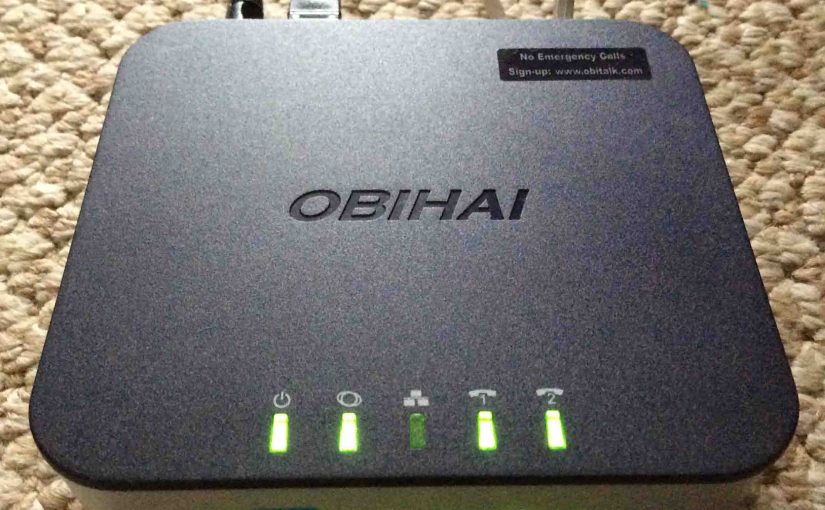 Picture of the Obihai OBi202 VoIP Phone Adapter, showing the top and front while operating.